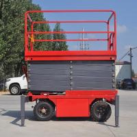 Elevador de tijera móvil hidráulico de 14 m y 1500 kg a la venta